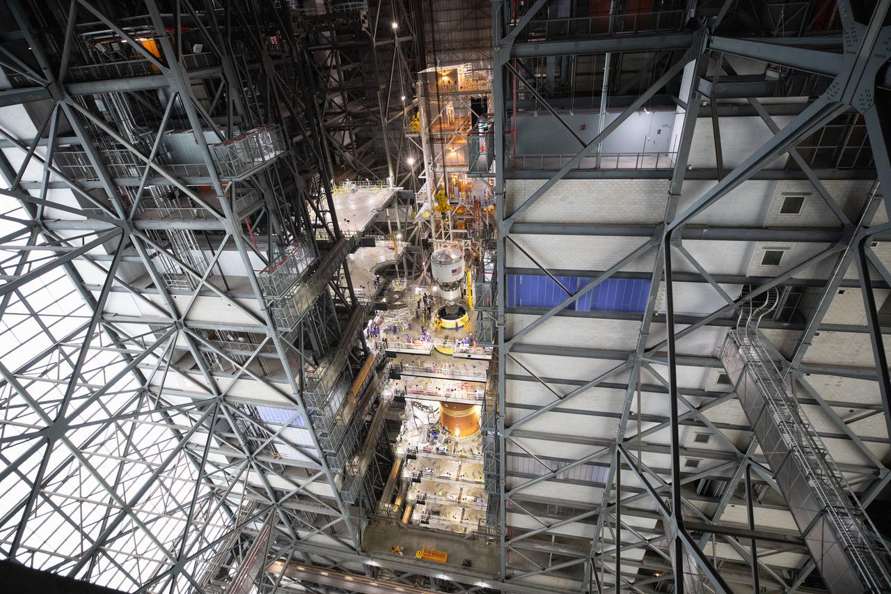 Teams with NASA’s Exploration Ground Systems Program begin integrating the interim cryogenic propulsion stage to the SLS (Space Launch System) launch vehicle stage adapter on Wednesday, April 30, 2025, inside the Vehicle Assembly Building at NASA’s Kennedy Space Center in Florida. The four-story propulsion system, built by Boeing and ULA (United Launch Alliance), is powered by an RL10 engine that will enable the Orion spacecraft to build up enough speed for the push toward the Moon during the Artemis II crewed test flight.