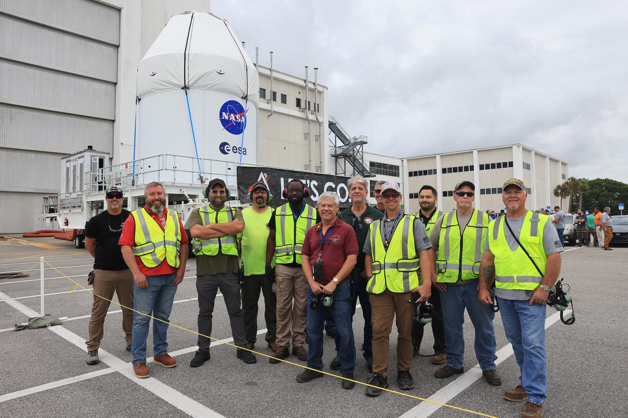 NASA’s KAMAG transporter carries the agency’s Artemis II Orion spacecraft from the Neil A. Armstrong Operations and Checkout Building to the Multi-Payload Processing Facility at Kennedy Space Center in Florida on Saturday, May 3, 2025. The Orion spacecraft will undergo fueling and processing operations at the Multi-Function Facility. The Artemis II test flight is the first crewed flight under NASA’s Artemis campaign and is another step toward missions on the lunar surface and helping the agency prepare for future human missions to Mars.