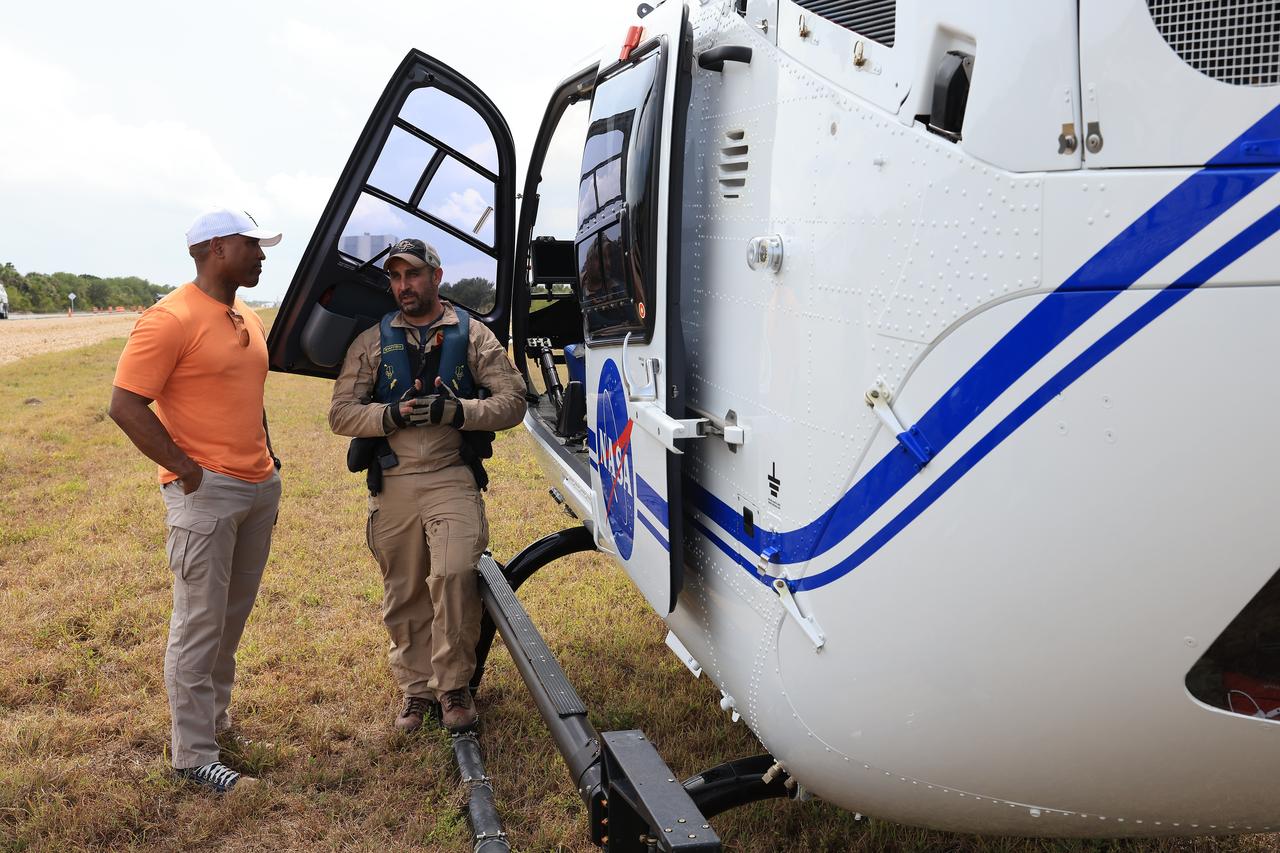 NASA astronaut Victor Glover (left) participates in emergency egress training with medical and fire-rescue personnel and teams near Launch Complex 39B at the agency’s Kennedy Space Center in Florida on Tuesday, May 6, 2025. During the training, Glover and fellow Artemis II crew members and backup members, along with members of the closeout crew, pad rescue team, and NASA’s Exploration Ground Systems Program practiced procedures in the event of an emergency at the launch pad.