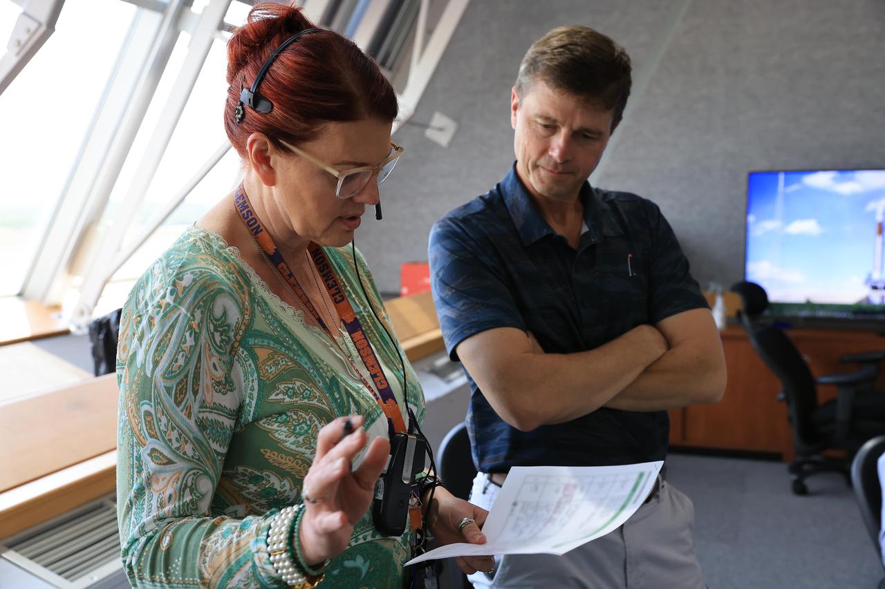 From left, Charlie Blackwell-Thompson, Artemis launch director with NASA’s Exploration Ground Systems Program and NASA astronaut Reid Wiseman, Artemis II commander, participate in an Artemis II launch countdown simulation inside Firing Room 1 in the Launch Control Center at NASA’s Kennedy Space Center in Florida on Wednesday, May 7, 2025. The simulations go through launch day scenarios to help launch team members test software and make adjustments if needed during countdown operations. Artemis II is the first crewed flight under NASA’s Artemis campaign and is another step toward missions on the lunar surface and helping the agency prepare for future human missions to Mars.