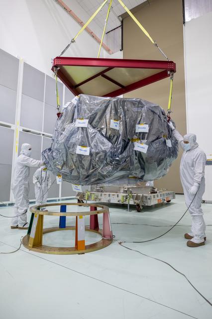 NASA image: NASA's IMAP Spacecraft Lift to Work Stand and Unbagging