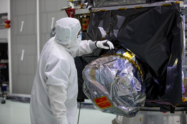 NASA's IMAP Spacecraft Lift to Work Stand and Unbagging
