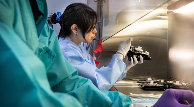 NASA image: Veggie Team Processes Pillows for Veg-03 MNO Seed Film