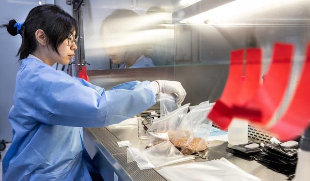 NASA image: Veggie Team Processes Pillows for Veg-03 MNO Seed Film