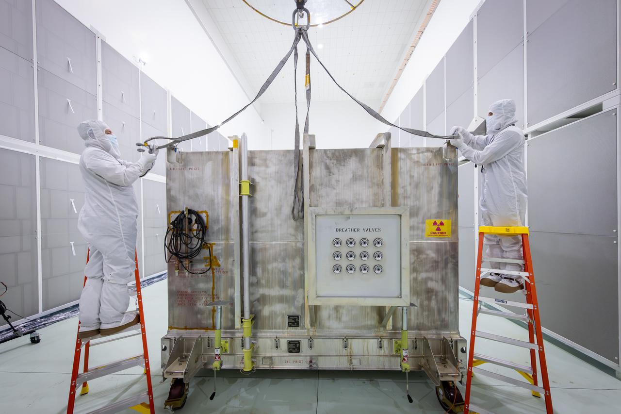 Technicians remove NASA’s IMAP (Interstellar Mapping and Acceleration Probe) spacecraft from its shipping container inside the high bay at the Astrotech Space Operations Facility near the agency’s Kennedy Space Center in Florida on Thursday, May 29, 2025. The observatory will study how the Sun shapes the boundaries of the heliosphere, the bubble protecting around our solar system, and is targeted for launch this fall aboard a SpaceX Falcon 9 rocket from Launch Complex 39A at NASA Kennedy. 