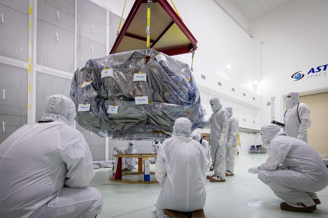 NASA image: NASA's IMAP Spacecraft Lift to Work Stand and Unbagging