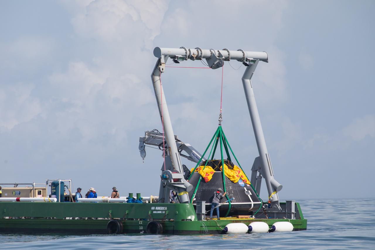 Teams with NASA and the Department of Defense (DoD) rehearse recovery procedures for a launch pad abort scenario off the coast of Florida near the agency’s Kennedy Space Center on Wednesday, June 11, 2025. Utilizing mannequin crew members inside the Crew Module Test Article (CMTA) – a full-scale mockup of the Orion spacecraft – the simulations practiced abort timelines and joint NASA and DoD recovery procedures supported by Artemis II launch and flight control teams, as NASA prepares to send four astronauts around the Moon and back next year as part of the agency’s first crewed Artemis mission.