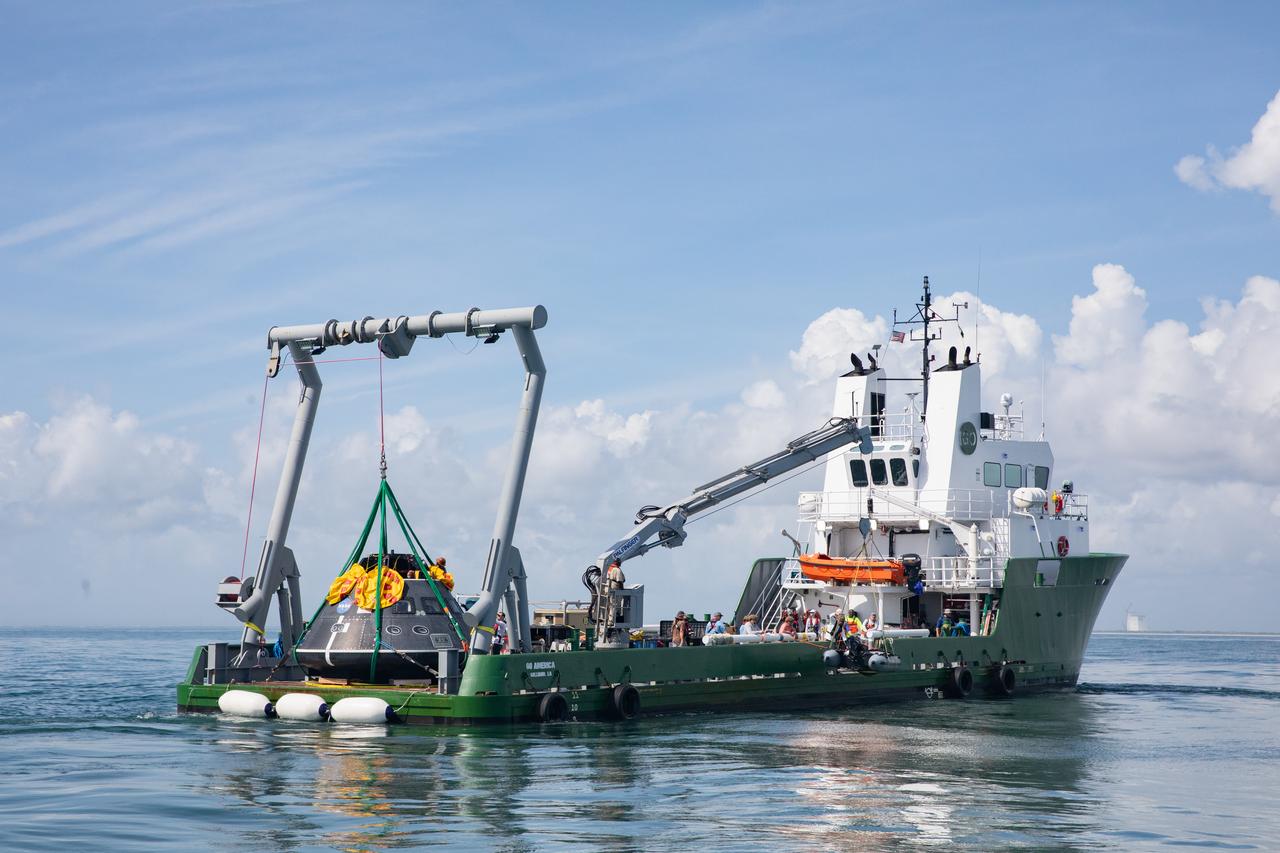 Teams with NASA and the Department of Defense (DoD) rehearse recovery procedures for a launch pad abort scenario off the coast of Florida near the agency’s Kennedy Space Center on Wednesday, June 11, 2025. Utilizing mannequin crew members inside the Crew Module Test Article (CMTA) – a full-scale mockup of the Orion spacecraft – the simulations practiced abort timelines and joint NASA and DoD recovery procedures supported by Artemis II launch and flight control teams, as NASA prepares to send four astronauts around the Moon and back next year as part of the agency’s first crewed Artemis mission.