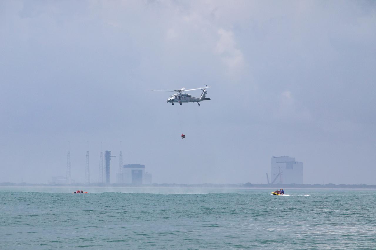 Teams with NASA and the Department of Defense (DoD) rehearse recovery procedures for a launch pad abort scenario off the coast of Florida near the agency’s Kennedy Space Center on Wednesday, June 11, 2025. Utilizing mannequin crew members inside the Crew Module Test Article (CMTA) – a full-scale mockup of the Orion spacecraft – the simulations practiced abort timelines and joint NASA and DoD recovery procedures supported by Artemis II launch and flight control teams, as NASA prepares to send four astronauts around the Moon and back next year as part of the agency’s first crewed Artemis mission.