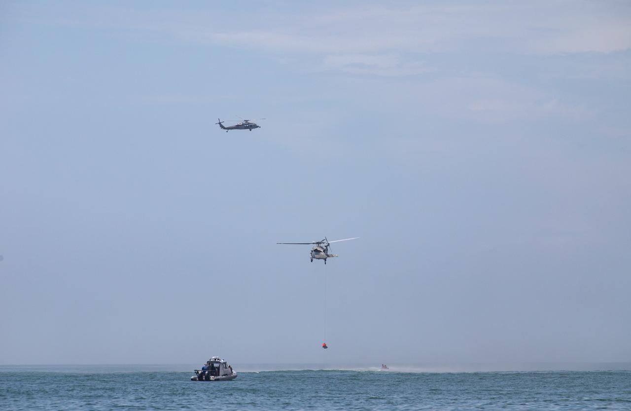 Teams with NASA and the Department of Defense (DoD) rehearse recovery procedures for a launch pad abort scenario off the coast of Florida near the agency’s Kennedy Space Center on Wednesday, June 11, 2025. Utilizing mannequin crew members inside the Crew Module Test Article (CMTA) – a full-scale mockup of the Orion spacecraft – the simulations practiced abort timelines and joint NASA and DoD recovery procedures supported by Artemis II launch and flight control teams, as NASA prepares to send four astronauts around the Moon and back next year as part of the agency’s first crewed Artemis mission.