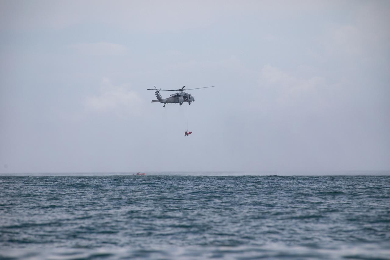 Teams with NASA and the Department of Defense (DoD) rehearse recovery procedures for a launch pad abort scenario off the coast of Florida near the agency’s Kennedy Space Center on Wednesday, June 11, 2025. Utilizing mannequin crew members inside the Crew Module Test Article (CMTA) – a full-scale mockup of the Orion spacecraft – the simulations practiced abort timelines and joint NASA and DoD recovery procedures supported by Artemis II launch and flight control teams, as NASA prepares to send four astronauts around the Moon and back next year as part of the agency’s first crewed Artemis mission.