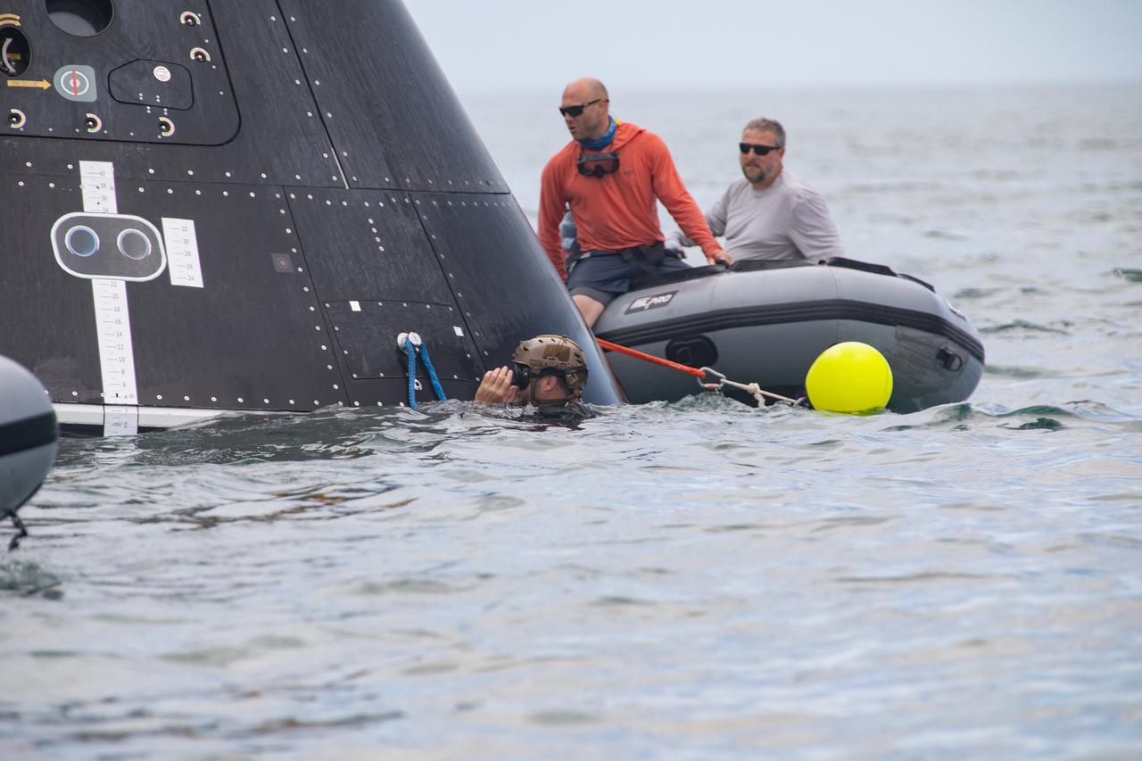 Teams with NASA and the Department of Defense (DoD) rehearse recovery procedures for a launch pad abort scenario off the coast of Florida near the agency’s Kennedy Space Center on Wednesday, June 11, 2025. Utilizing mannequin crew members inside the Crew Module Test Article (CMTA) – a full-scale mockup of the Orion spacecraft – the simulations practiced abort timelines and joint NASA and DoD recovery procedures supported by Artemis II launch and flight control teams, as NASA prepares to send four astronauts around the Moon and back next year as part of the agency’s first crewed Artemis mission.