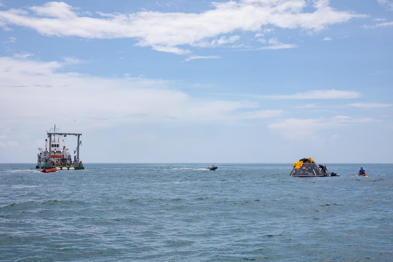 Teams with NASA and the Department of Defense (DoD) rehearse recovery procedures for a launch pad abort scenario off the coast of Florida near the agency’s Kennedy Space Center on Wednesday, June 11, 2025. Utilizing mannequin crew members inside the Crew Module Test Article (CMTA) – a full-scale mockup of the Orion spacecraft – the simulations practiced abort timelines and joint NASA and DoD recovery procedures supported by Artemis II launch and flight control teams, as NASA prepares to send four astronauts around the Moon and back next year as part of the agency’s first crewed Artemis mission.