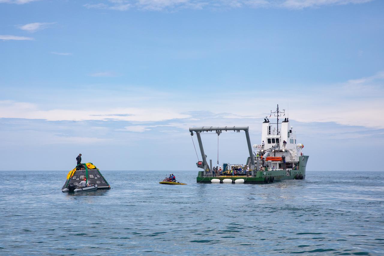 Teams with NASA and the Department of Defense (DoD) rehearse recovery procedures for a launch pad abort scenario off the coast of Florida near the agency’s Kennedy Space Center on Wednesday, June 11, 2025. Utilizing mannequin crew members inside the Crew Module Test Article (CMTA) – a full-scale mockup of the Orion spacecraft – the simulations practiced abort timelines and joint NASA and DoD recovery procedures supported by Artemis II launch and flight control teams, as NASA prepares to send four astronauts around the Moon and back next year as part of the agency’s first crewed Artemis mission.