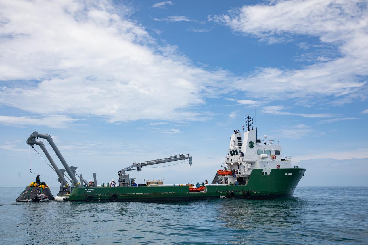 Teams with NASA and the Department of Defense (DoD) rehearse recovery procedures for a launch pad abort scenario off the coast of Florida near the agency’s Kennedy Space Center on Wednesday, June 11, 2025. Utilizing mannequin crew members inside the Crew Module Test Article (CMTA) – a full-scale mockup of the Orion spacecraft – the simulations practiced abort timelines and joint NASA and DoD recovery procedures supported by Artemis II launch and flight control teams, as NASA prepares to send four astronauts around the Moon and back next year as part of the agency’s first crewed Artemis mission.
