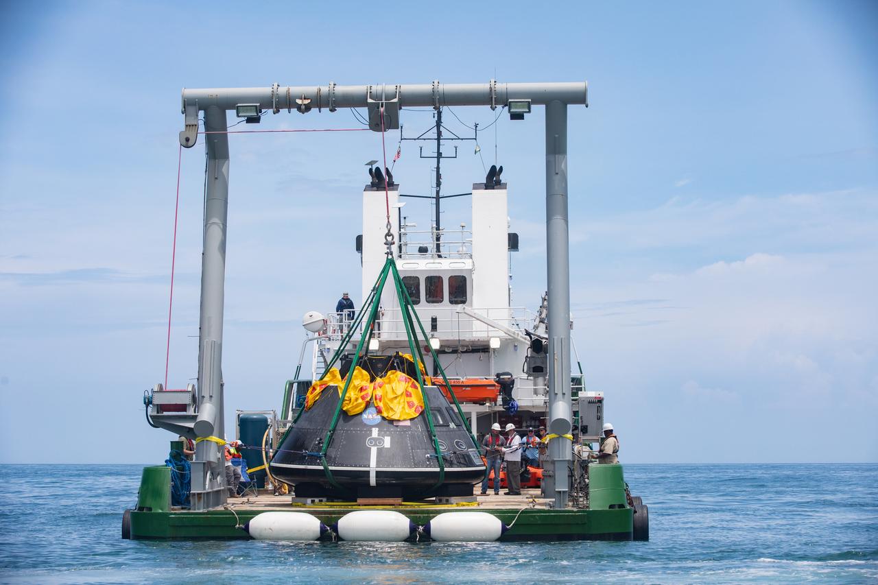 Teams with NASA and the Department of Defense (DoD) rehearse recovery procedures for a launch pad abort scenario off the coast of Florida near the agency’s Kennedy Space Center on Wednesday, June 11, 2025. Utilizing mannequin crew members inside the Crew Module Test Article (CMTA) – a full-scale mockup of the Orion spacecraft – the simulations practiced abort timelines and joint NASA and DoD recovery procedures supported by Artemis II launch and flight control teams, as NASA prepares to send four astronauts around the Moon and back next year as part of the agency’s first crewed Artemis mission.