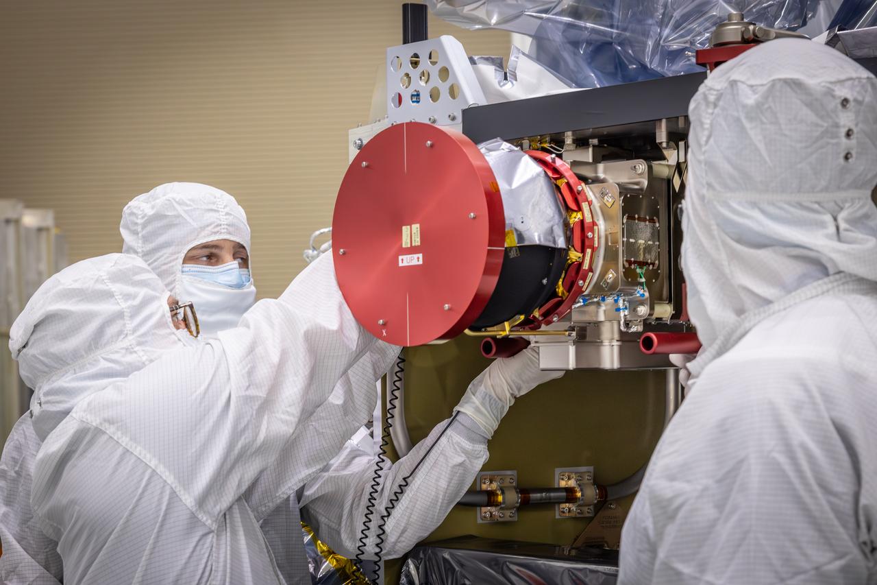 Technicians reintegrate the Compact Dual Ion Composition Experiment (CoDICE) instrument of NASA’s IMAP (Interstellar Mapping and Acceleration Probe) observatory inside the high bay at the Astrotech Space Operations Facility near the agency’s Kennedy Space Center in Florida on Friday, June 20, 2025. CoDICE will measure solar wind particles flowing from the Sun and pickup ions that entered the heliosphere from outside the solar system, as well as the direction of travel, and types of specific species of pickup ions. Launch of the IMAP mission is targeted for no earlier than September 2025 aboard a SpaceX Falcon 9 rocket from Launch Complex 39A at NASA Kennedy.