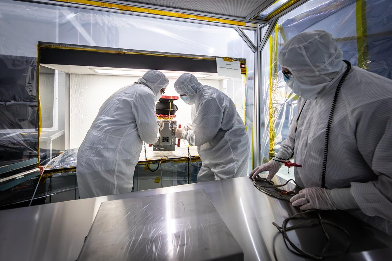 Technicians reintegrate the Compact Dual Ion Composition Experiment (CoDICE) instrument of NASA’s IMAP (Interstellar Mapping and Acceleration Probe) observatory inside the high bay at the Astrotech Space Operations Facility near the agency’s Kennedy Space Center in Florida on Friday, June 20, 2025. CoDICE will measure solar wind particles flowing from the Sun and pickup ions that entered the heliosphere from outside the solar system, as well as the direction of travel, and types of specific species of pickup ions. Launch of the IMAP mission is targeted for no earlier than September 2025 aboard a SpaceX Falcon 9 rocket from Launch Complex 39A at NASA Kennedy.