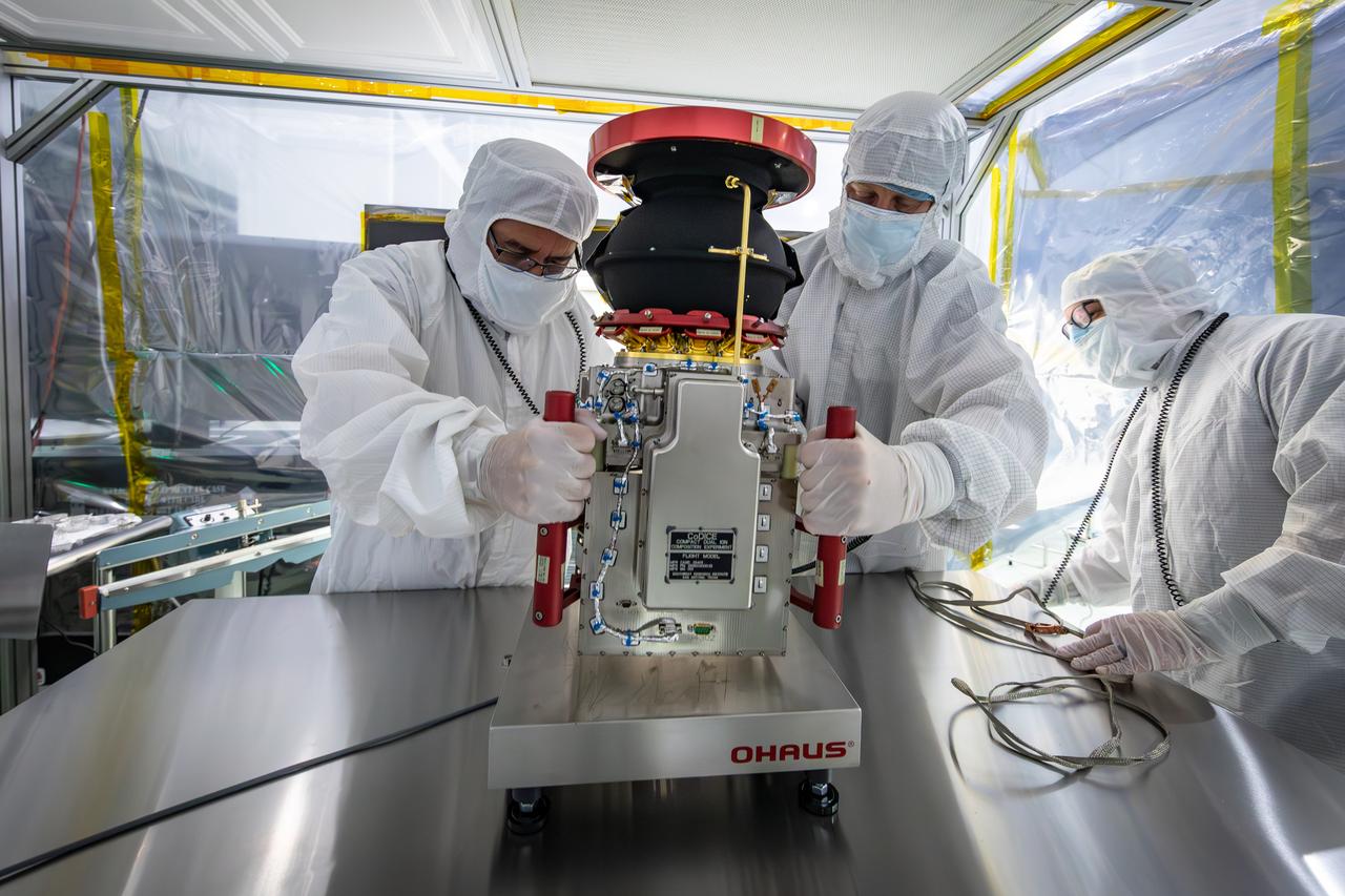 Technicians reintegrate the Compact Dual Ion Composition Experiment (CoDICE) instrument of NASA’s IMAP (Interstellar Mapping and Acceleration Probe) observatory inside the high bay at the Astrotech Space Operations Facility near the agency’s Kennedy Space Center in Florida on Friday, June 20, 2025. CoDICE will measure solar wind particles flowing from the Sun and pickup ions that entered the heliosphere from outside the solar system, as well as the direction of travel, and types of specific species of pickup ions. Launch of the IMAP mission is targeted for no earlier than September 2025 aboard a SpaceX Falcon 9 rocket from Launch Complex 39A at NASA Kennedy.