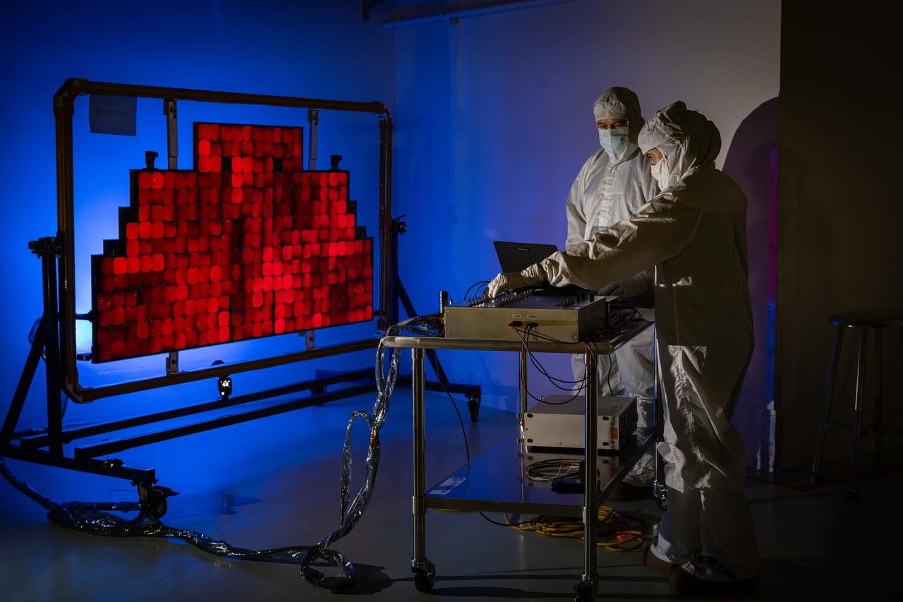 Technicians conduct an illumination test by flashing a bright light that simulates the Sun into the solar array for NASA’s IMAP (Interstellar Mapping and Acceleration Probe) observatory inside the high bay at the Astrotech Space Operations Facility near the agency’s Kennedy Space Center in Florida on Friday, June 20, 2025. The IMAP solar array converts sunlight into approximately 500 watts of power, and IMAP’s spin axis, which comes through the center of the solar arrays, points sunward to provide constant power. Launch is targeted for no earlier than September 2025 aboard a SpaceX Falcon 9 rocket from Launch Complex 39A at NASA Kennedy.