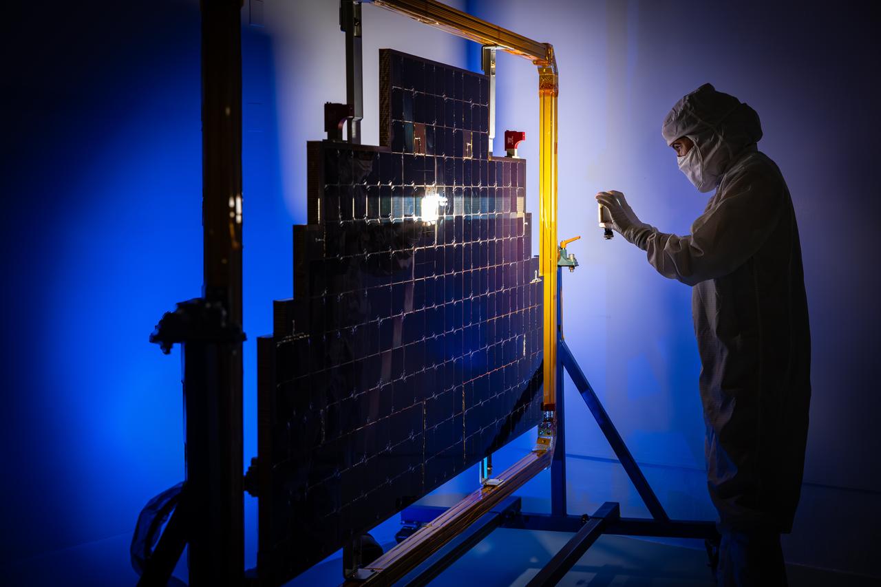 Technicians conduct an illumination test by flashing a bright light that simulates the Sun into the solar array for NASA’s IMAP (Interstellar Mapping and Acceleration Probe) observatory inside the high bay at the Astrotech Space Operations Facility near the agency’s Kennedy Space Center in Florida on Friday, June 20, 2025. The IMAP solar array converts sunlight into approximately 500 watts of power, and IMAP’s spin axis, which comes through the center of the solar arrays, points sunward to provide constant power. Launch is targeted for no earlier than September 2025 aboard a SpaceX Falcon 9 rocket from Launch Complex 39A at NASA Kennedy.