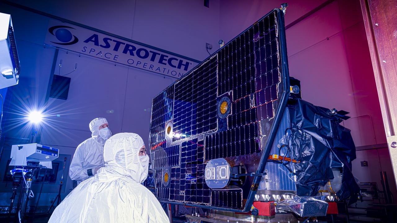 Technicians inspect the solar array panel attached to NASA’s Carruthers Geocorona Observatory on Wednesday, July 23, 2025, at the Astrotech Space Operations Facility near the agency’s Kennedy Space Center in Florida. The solar array will use the Sun to help power Carruthers Geocorona Observatory as it operates at Lagrange Point 1 (L1), an orbit point between the Earth and Sun about one million miles away. Carruthers will use its ultraviolet cameras to monitor how space weather from the Sun impacts the exosphere, the outermost part of Earth’s atmosphere. The observatory will launch as a rideshare with NASA’s IMAP (Interstellar Mapping and Acceleration Probe) no earlier than September 2025.