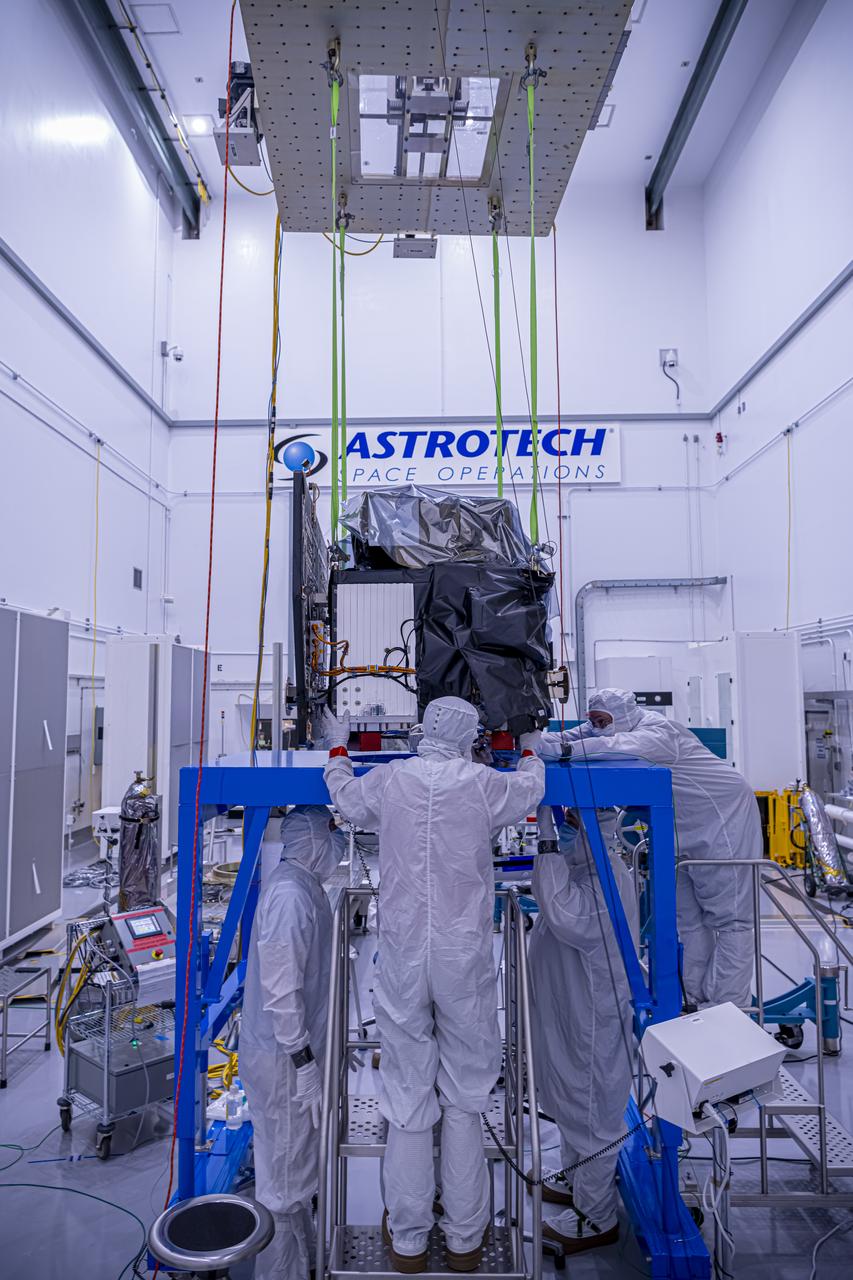 A crane lifts NASA’s Carruthers Geocorona Observatory on Thursday, July 24, 2025, at the Astrotech Space Operations Facility near the agency’s Kennedy Space Center in Florida. The Carruthers Geocorona Observatory is a small satellite set to operate at Lagrange Point 1 (L1), an orbit point between the Earth and Sun about one million miles away. Carruthers will use its ultraviolet cameras to monitor how space weather from the Sun impacts the exosphere, the outermost part of Earth’s atmosphere. The observatory will launch as a rideshare with NASA’s IMAP (Interstellar Mapping and Acceleration Probe) no earlier than September 2025.