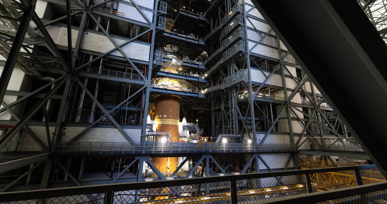 NASA’s Artemis II SLS (Space Launch System) rocket topped by its upper stage booster – the interim cryogenic propulsion stage – stands atop the mobile launcher inside the Vehicle Assembly Building at NASA’s Kennedy Space Center in Florida on Thursday, July 24, 2025. The Artemis II mission is the first crewed flight under NASA’s Artemis campaign and is another step toward missions on the lunar surface and helping the agency prepare for future human missions to Mars.