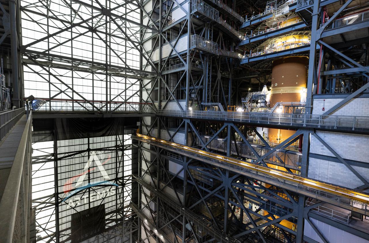 NASA’s Artemis II SLS (Space Launch System) rocket topped by its upper stage booster – the interim cryogenic propulsion stage – stands atop the mobile launcher inside the Vehicle Assembly Building at NASA’s Kennedy Space Center in Florida on Thursday, July 24, 2025. The Artemis II mission is the first crewed flight under NASA’s Artemis campaign and is another step toward missions on the lunar surface and helping the agency prepare for future human missions to Mars.