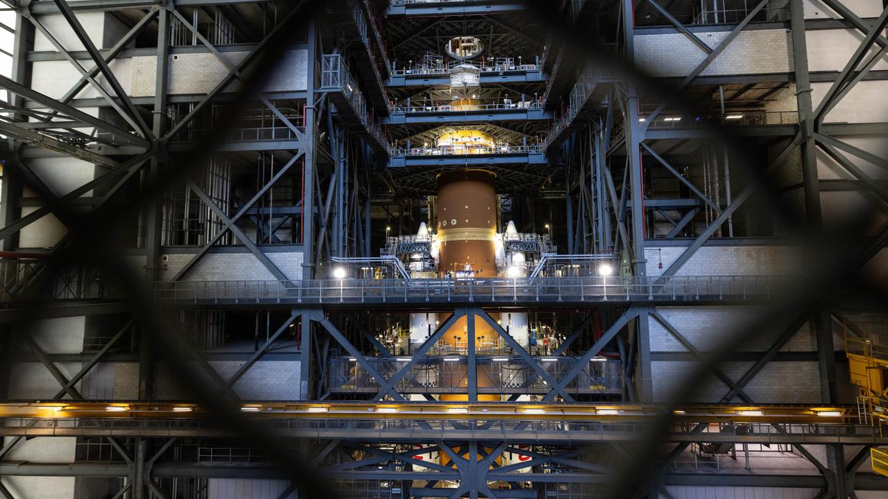 NASA’s Artemis II SLS (Space Launch System) rocket topped by its upper stage booster – the interim cryogenic propulsion stage – stands atop the mobile launcher inside the Vehicle Assembly Building at NASA’s Kennedy Space Center in Florida on Thursday, July 24, 2025. The Artemis II mission is the first crewed flight under NASA’s Artemis campaign and is another step toward missions on the lunar surface and helping the agency prepare for future human missions to Mars.