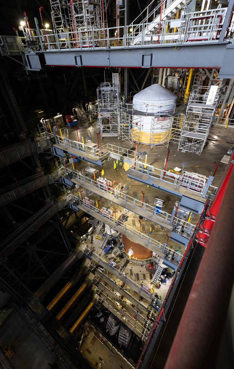 NASA’s Artemis II SLS (Space Launch System) rocket topped by its upper stage booster – the interim cryogenic propulsion stage – stands atop the mobile launcher inside the Vehicle Assembly Building at NASA’s Kennedy Space Center in Florida on Thursday, July 24, 2025. The Artemis II mission is the first crewed flight under NASA’s Artemis campaign and is another step toward missions on the lunar surface and helping the agency prepare for future human missions to Mars.