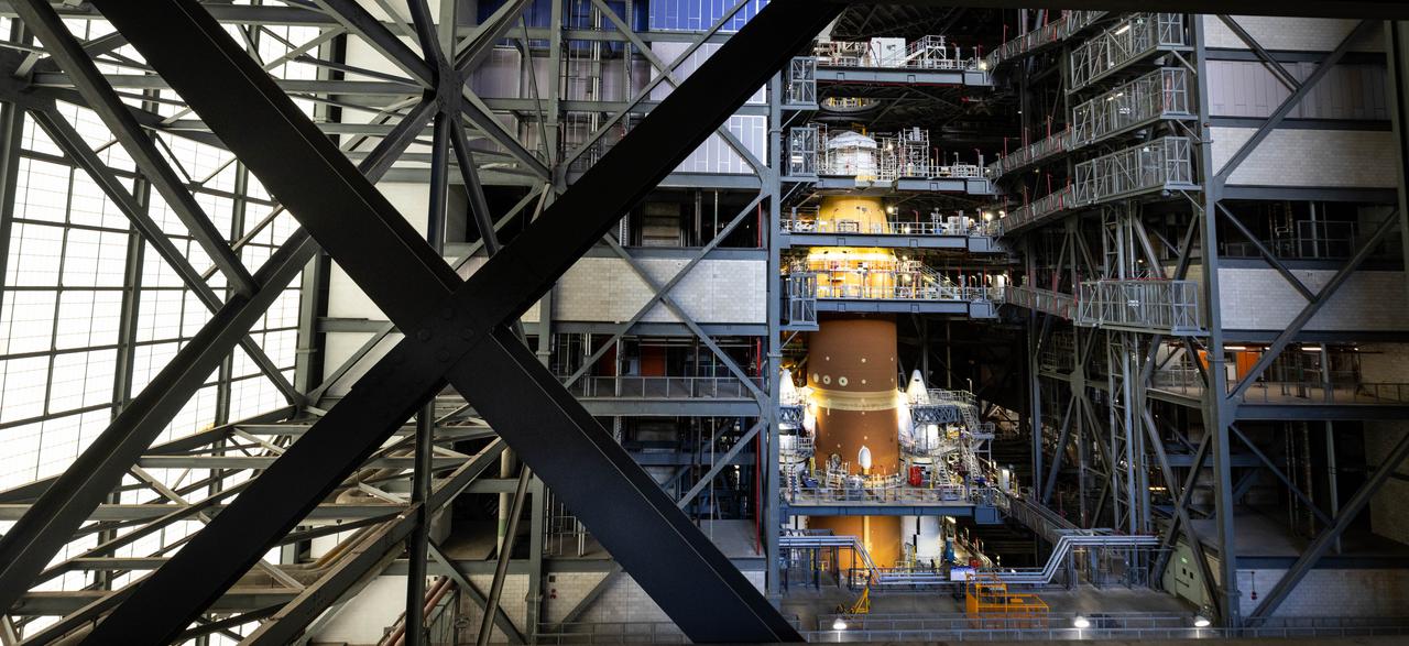 NASA’s Artemis II SLS (Space Launch System) rocket topped by its upper stage booster – the interim cryogenic propulsion stage – stands atop the mobile launcher inside the Vehicle Assembly Building at NASA’s Kennedy Space Center in Florida on Thursday, July 24, 2025. The Artemis II mission is the first crewed flight under NASA’s Artemis campaign and is another step toward missions on the lunar surface and helping the agency prepare for future human missions to Mars.