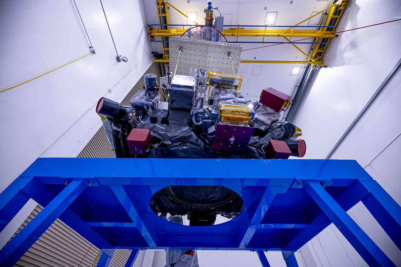 Technicians use a crane to lift the National Oceanic and Atmospheric Administration’s (NOAA) Space Weather Follow On–Lagrange 1 (SWFO-L1) Observatory onto a work stand on Friday, July 25, 2025, during prelaunch processing at the Astrotech Space Operations Facility near NASA’s Kennedy Space Center in Florida. The SWFO-L1 mission will observe solar eruptions, and monitor incoming space weather 24/7, providing early warnings and validating forecasts that protect vital communication and navigation infrastructure, economic interests, and national security, both on Earth and in space. The observatory will launch as a rideshare with NASA’s IMAP (Interstellar Mapping and Acceleration Probe) no earlier than September 2025.