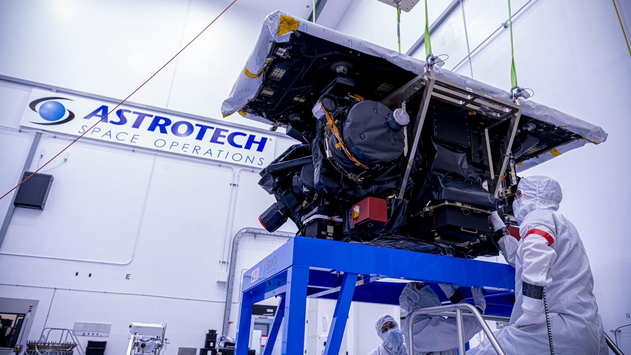 Technicians use a crane to lift the National Oceanic and Atmospheric Administration’s (NOAA) Space Weather Follow On–Lagrange 1 (SWFO-L1) Observatory onto a work stand on Friday, July 25, 2025, during prelaunch processing at the Astrotech Space Operations Facility near NASA’s Kennedy Space Center in Florida. The SWFO-L1 mission will observe solar eruptions, and monitor incoming space weather 24/7, providing early warnings and validating forecasts that protect vital communication and navigation infrastructure, economic interests, and national security, both on Earth and in space. The observatory will launch as a rideshare with NASA’s IMAP (Interstellar Mapping and Acceleration Probe) no earlier than September 2025.