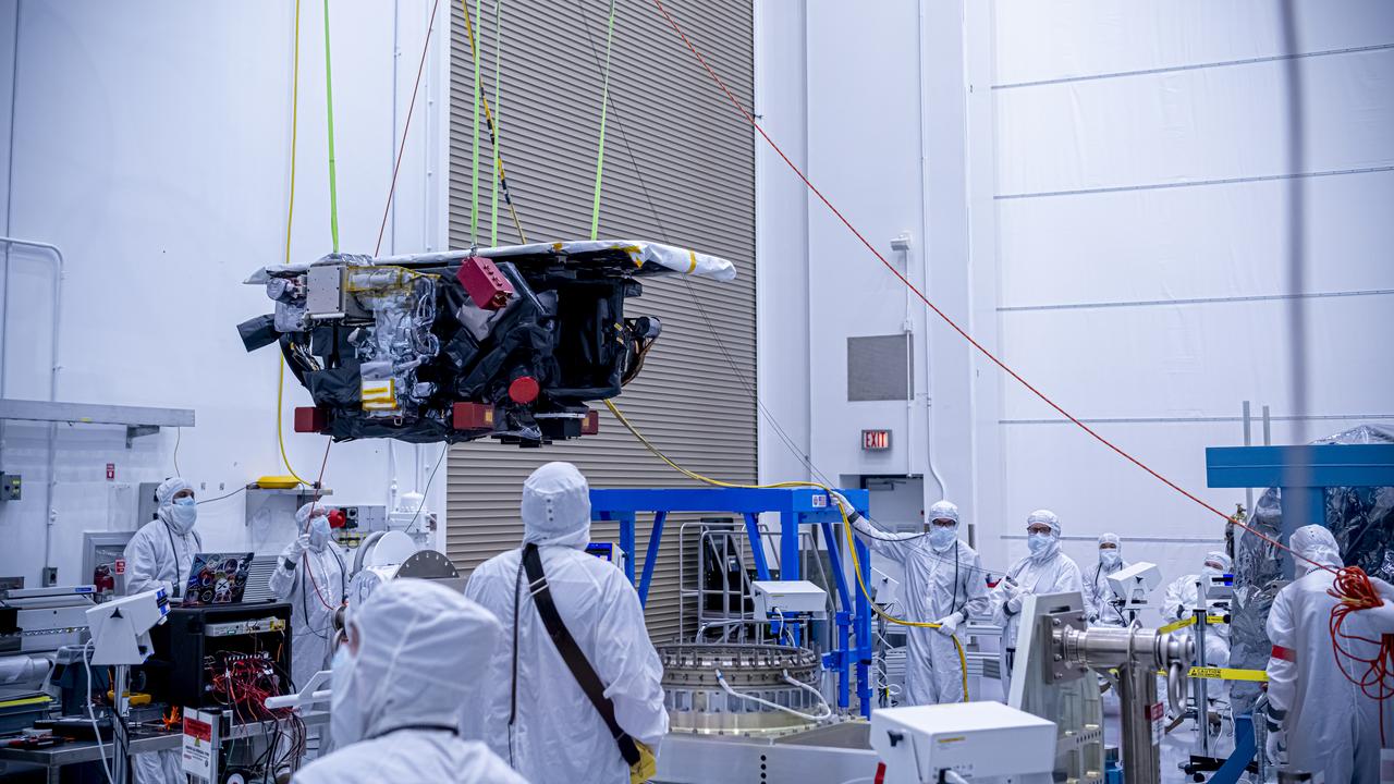 Technicians use a crane to lift the National Oceanic and Atmospheric Administration’s (NOAA) Space Weather Follow On–Lagrange 1 (SWFO-L1) Observatory onto a work stand on Friday, July 25, 2025, during prelaunch processing at the Astrotech Space Operations Facility near NASA’s Kennedy Space Center in Florida. The SWFO-L1 mission will observe solar eruptions, and monitor incoming space weather 24/7, providing early warnings and validating forecasts that protect vital communication and navigation infrastructure, economic interests, and national security, both on Earth and in space. The observatory will launch as a rideshare with NASA’s IMAP (Interstellar Mapping and Acceleration Probe) no earlier than September 2025.