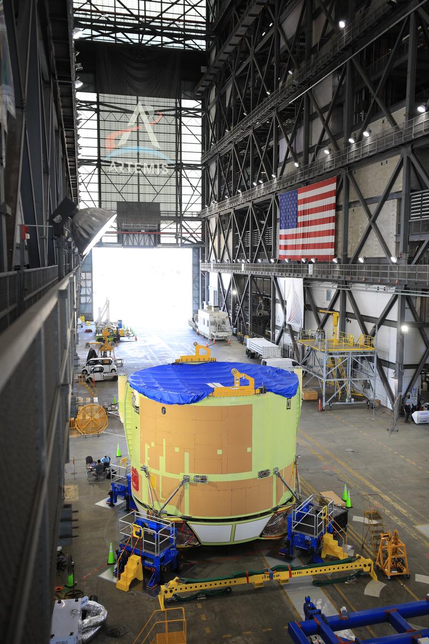 Teams from NASA’s Kennedy Space Center in Florida integrate NASA’s Artemis III SLS (Space Launch System) core stage engine section with its boat-tail inside the spaceport’s Vehicle Assembly Building on Wednesday, July 30, 2025. The boat-tail is a fairing-like structure that protects the bottom end of the core stage, while the engine section is one the most complex and intricate parts of the rocket stage that will help power the Artemis missions to the Moon. 
