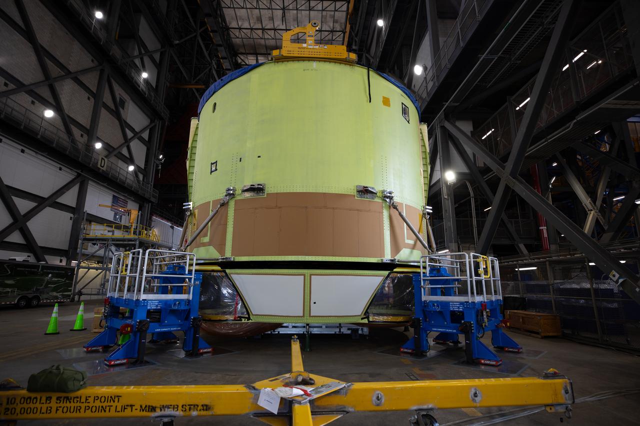 Teams from NASA’s Kennedy Space Center in Florida integrate NASA’s Artemis III SLS (Space Launch System) core stage engine section with its boat-tail inside the spaceport’s Vehicle Assembly Building on Wednesday, July 30, 2025. The boat-tail is a fairing-like structure that protects the bottom end of the core stage, while the engine section is one the most complex and intricate parts of the rocket stage that will help power the Artemis missions to the Moon. 