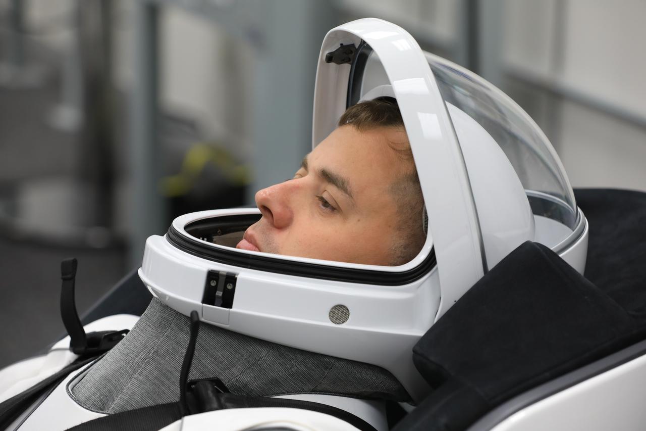 Roscosmos cosmonaut Oleg Platonov conducts leak checks for his SpaceX spacesuit inside the crew suit-up room in the Neil A. Armstrong Operations and Checkout Building at the agency’s Kennedy Space Center in Florida on Thursday, July 31, 2025, during its first attempt of NASA’s SpaceX Crew-11 mission to the International Space Station. NASA astronauts Zena Cardman and Mike Fincke, along with JAXA (Japan Aerospace Exploration Agency) astronaut Kimiya Yui and Platonov, are scheduled to lift off aboard SpaceX’s Dragon spacecraft and Falcon 9 rocket for its second attempt at 11:43 a.m. EDT Friday. Aug. 1, 2025, from Launch Complex 39A at NASA Kennedy. 