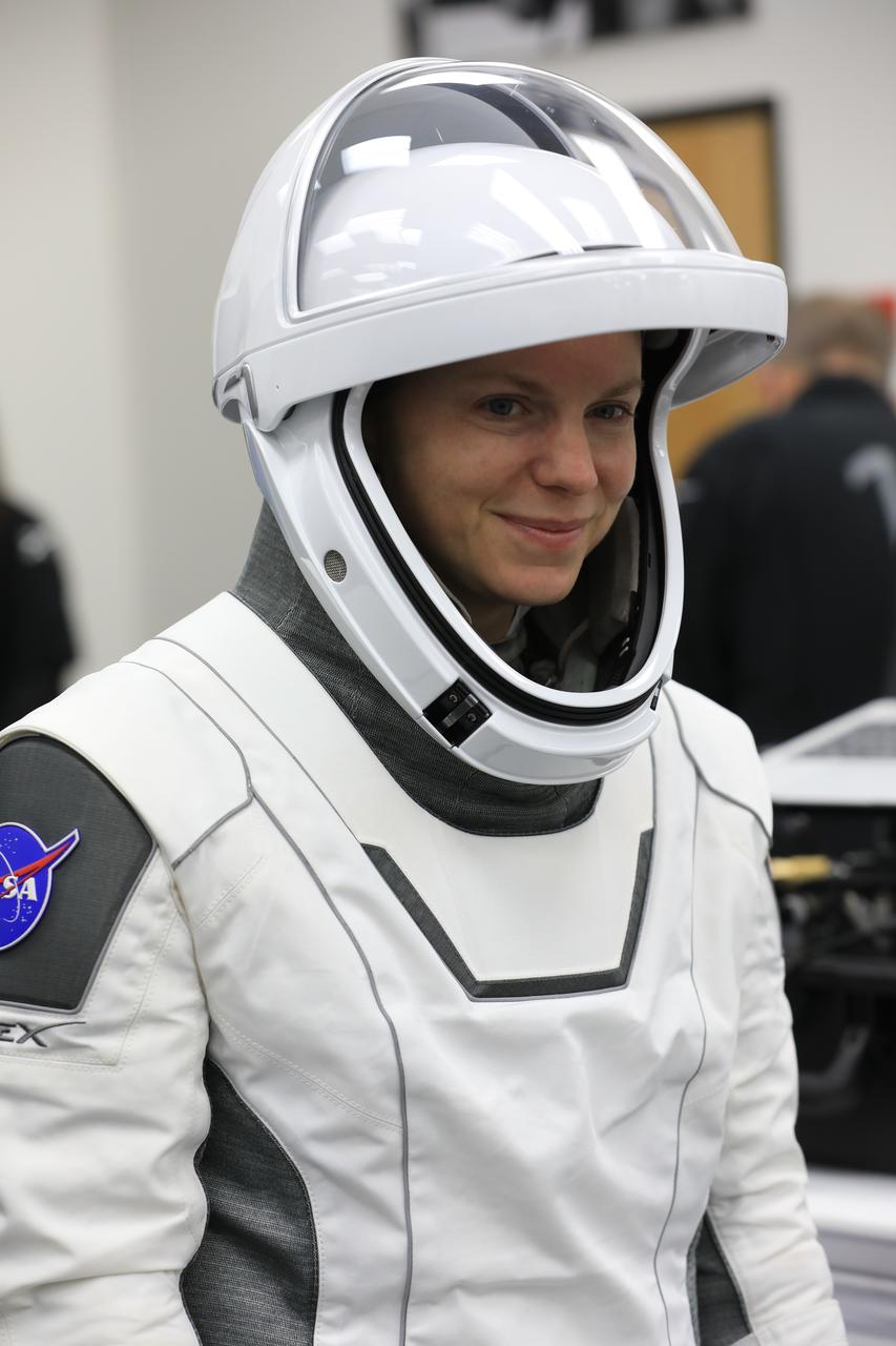NASA astronaut Zena Cardman conducts leak checks for her SpaceX spacesuit inside the crew suit-up room in the Neil A. Armstrong Operations and Checkout Building at the agency’s Kennedy Space Center in Florida on Thursday, July 31, 2025, during its first attempt of NASA’s SpaceX Crew-11 mission to the International Space Station. Cardman and fellow NASA astronaut Mike Fincke, along with JAXA (Japan Aerospace Exploration Agency) astronaut Kimiya Yui and Roscosmos cosmonaut Oleg Platonov, are scheduled to lift off aboard SpaceX’s Dragon spacecraft and Falcon 9 rocket for its second attempt at 11:43 a.m. EDT Friday, Aug. 1, 2025, from Launch Complex 39A at NASA Kennedy.