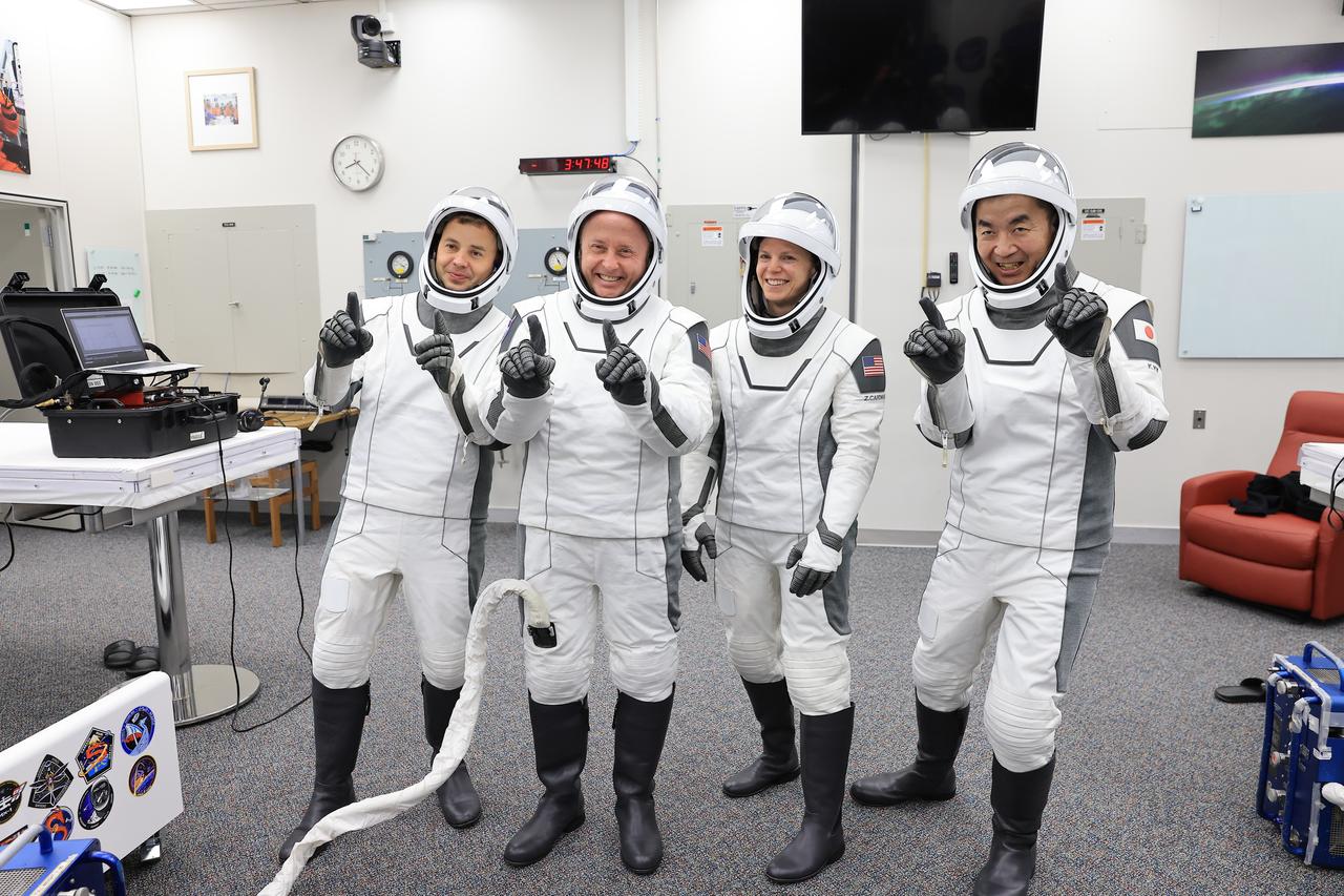 NASA’s SpaceX Crew-11 members suit up in the Neil A. Armstrong Operations and Checkout Building at the agency’s Kennedy Space Center in Florida on Thursday, July 31, 2025, during the first attempt of NASA’s SpaceX Crew-11 mission to the International Space Station. From right, JAXA (Japan Aerospace Exploration Agency) astronaut Kimiya Yui along with NASA astronauts Zena Cardman and Mike Fincke, and Roscosmos cosmonaut Oleg Platonov, are scheduled to lift off aboard SpaceX’s Dragon spacecraft and Falcon 9 rocket at for its second attempt 11:43 a.m. EDT Friday, Aug. 1, 2025, from Launch Complex 39A at NASA Kennedy.