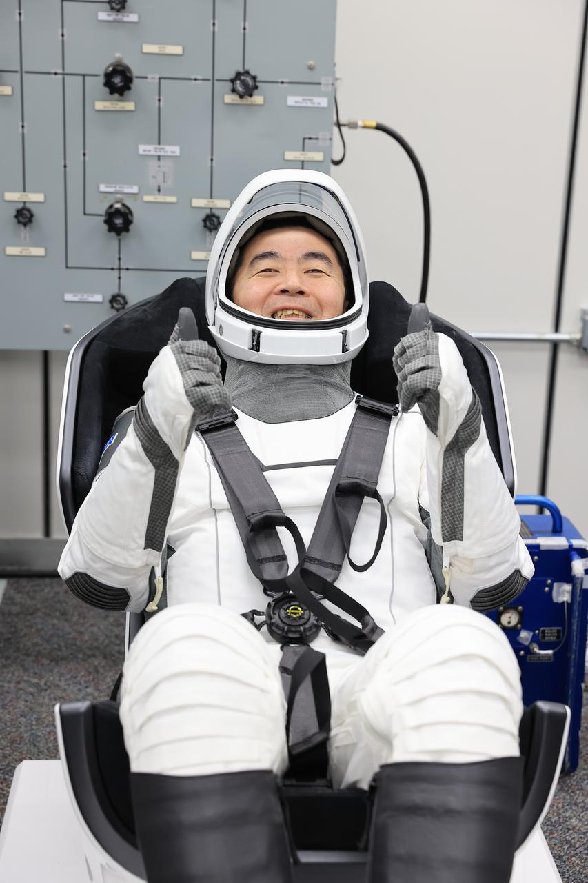 JAXA (Japan Aerospace Exploration Agency) astronaut Kimiya Yui conducts leak checks for his SpaceX spacesuit inside the crew suit-up room in the Neil A. Armstrong Operations and Checkout Building at the agency’s Kennedy Space Center in Florida during the second launch attempt NASA’s SpaceX Crew-11 mission to the International Space Station on Friday, Aug. 1, 2025. Yui, NASA astronauts Zena Cardman and Mike Fincke, along with Roscosmos cosmonaut Oleg Platonov, are scheduled to lift off aboard SpaceX’s Dragon spacecraft and Falcon 9 rocket at 11:43 a.m. EDT, from Launch Complex 39A at NASA Kennedy.