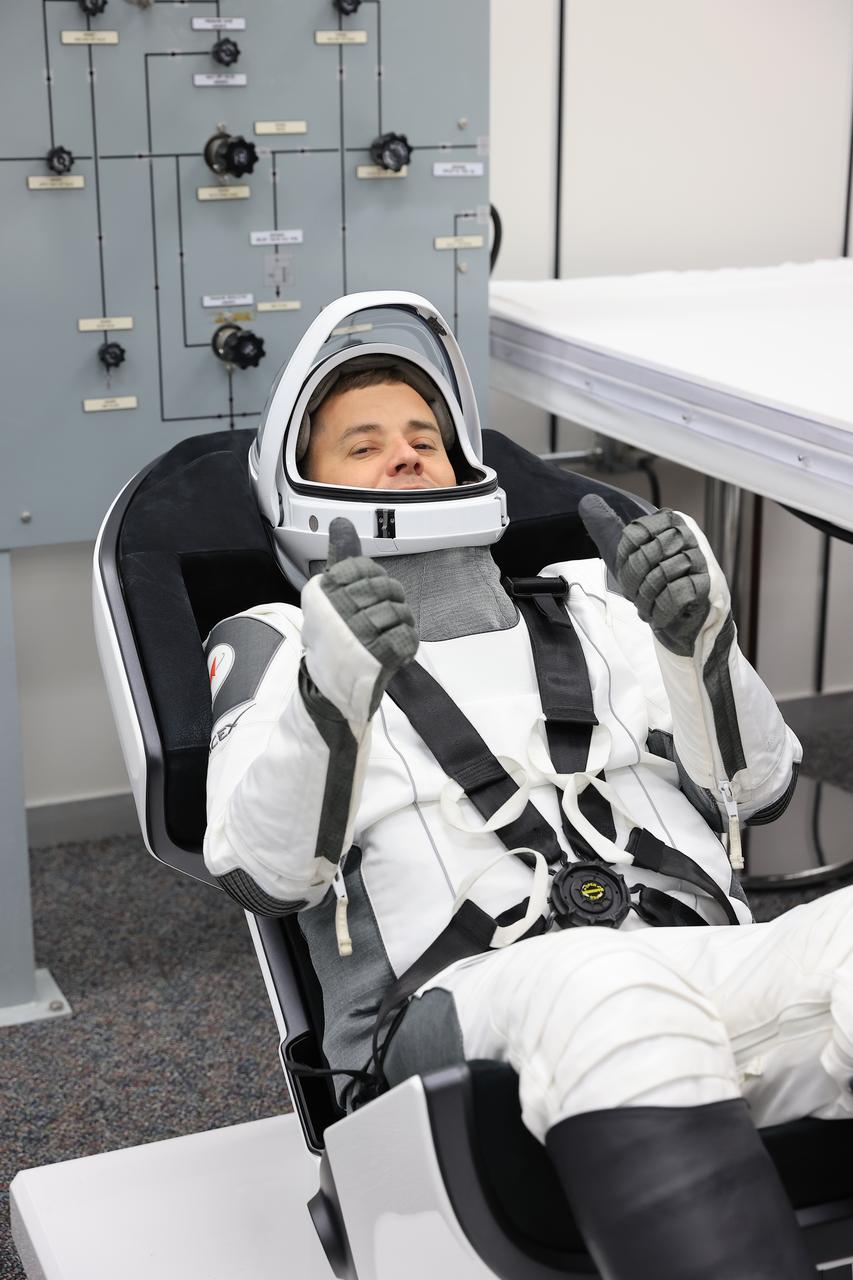 Roscosmos cosmonaut Oleg Platonov conducts leak checks for his SpaceX spacesuit inside the crew suit-up room in the Neil A. Armstrong Operations and Checkout Building at the agency’s Kennedy Space Center in Florida during the second launch attempt of NASA’s SpaceX Crew-11 mission to the International Space Station on Friday, Aug. 1, 2025. NASA astronauts Zena Cardman and Mike Fincke, along with JAXA (Japan Aerospace Exploration Agency) astronaut Kimiya Yui and Platonov, are scheduled to lift off aboard SpaceX’s Dragon spacecraft and Falcon 9 rocket at 11:43 a.m. EDT from Launch Complex 39A at NASA Kennedy.