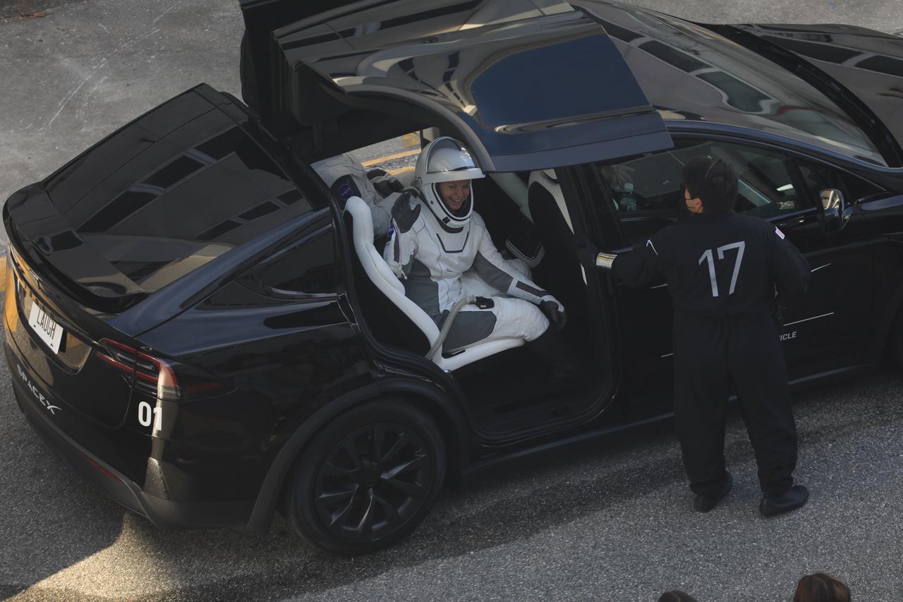 NASA astronaut Zena Cardman waves inside a customized electric vehicle to family and friend’s moments before she is taken to Launch Pad 39A at the agency’s Kennedy Space Center in Florida on Friday, Aug. 1, 2025, during the second launch attempt of NASA’s SpaceX Crew-11 mission to the International Space Station. Cardman and fellow NASA astronaut Mike Fincke, along with JAXA (Japan Aerospace Exploration Agency) astronaut Kimiya Yui and Roscosmos cosmonaut Oleg Platonov, are scheduled to lift off aboard SpaceX’s Dragon spacecraft and Falcon 9 rocket at 11:43 a.m. EDT, from Launch Complex 39A at NASA Kennedy.