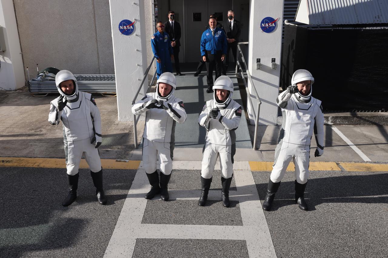 From right to left, JAXA (Japan Aerospace Exploration Agency) astronaut Kimiya Yui, NASA astronauts Zena Cardman and Mike Fincke, along with and Roscosmos cosmonaut Oleg Platonov wave to family and friends as they walk out of the Neil A. Armstrong Operations and Checkout Building at the agency’s Kennedy Space Center in Florida during the second launch attempt of NASA’s SpaceX Crew-11 mission to the International Space Station on Friday, Aug. 1, 2025. Crew-11 is scheduled to lift off aboard SpaceX’s Dragon spacecraft and Falcon 9 rocket at 11:43 a.m. EDT, from Launch Complex 39A at NASA Kennedy.