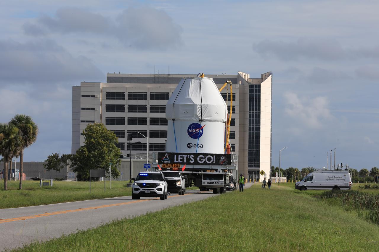 Crews transport NASA’s Artemis II Orion spacecraft from the Multi-Payload Processing Facility to the Launch Abort System Facility at the agency’s Kennedy Space Center in Florida on Sunday, Aug. 10, 2025. Technicians will integrate Orion with its 44-foot-tall launch abort system designed to carry the crew to safety in the event of an emergency during launch or ascent atop the SLS (Space Launch System) rocket. The Artemis II test flight will send NASA astronauts Reid Wiseman, Victor Glover, and Christina Koch, and CSA (Canadian Space Agency) astronaut Jeremy Hansen around the Moon and return them safely back home.