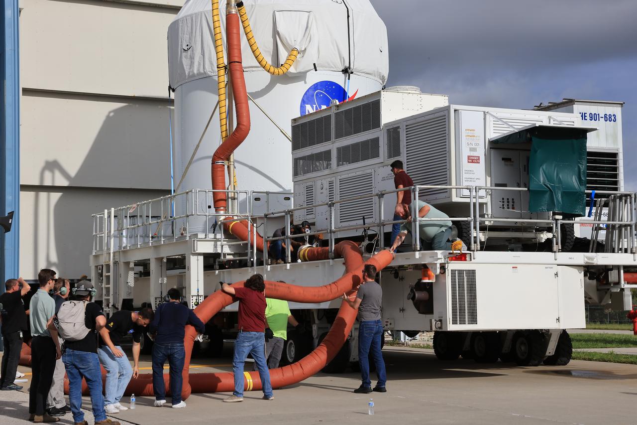 Crews prepare to move NASA’s Artemis II Orion spacecraft from the Multi-Payload Processing Facility to the Launch Abort System Facility at the agency’s Kennedy Space Center in Florida on Sunday, Aug. 10, 2025. Technicians will integrate Orion with its 44-foot-tall launch abort system designed to carry the crew to safety in the event of an emergency during launch or ascent atop the SLS (Space Launch System) rocket. The Artemis II test flight will send NASA astronauts Reid Wiseman, Victor Glover, and Christina Koch, and CSA (Canadian Space Agency) astronaut Jeremy Hansen around the Moon and return them safely back home.