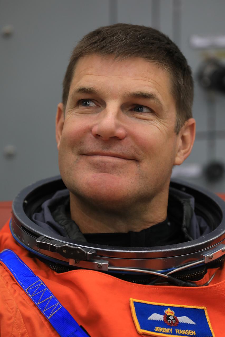 CSA (Canadian Space Agency) astronaut Jeremy Hansen, Artemis II mission specialist, smiles during suit-up operations inside the Neil A. Armstrong Operations and Checkout Building at NASA’s Kennedy Space Center in Florida on Monday, Aug. 11, 2025. During a two-day operation, the Artemis II team practiced night-run demonstrations of different launch day scenarios like suit-up operations, walk-out, and arriving at the launch pad for the Artemis II test flight. Through the Artemis campaign, NASA will send astronauts to explore the Moon for scientific discovery, economic benefits, and to build the foundation for the first crewed missions to Mars – for the benefit of all.