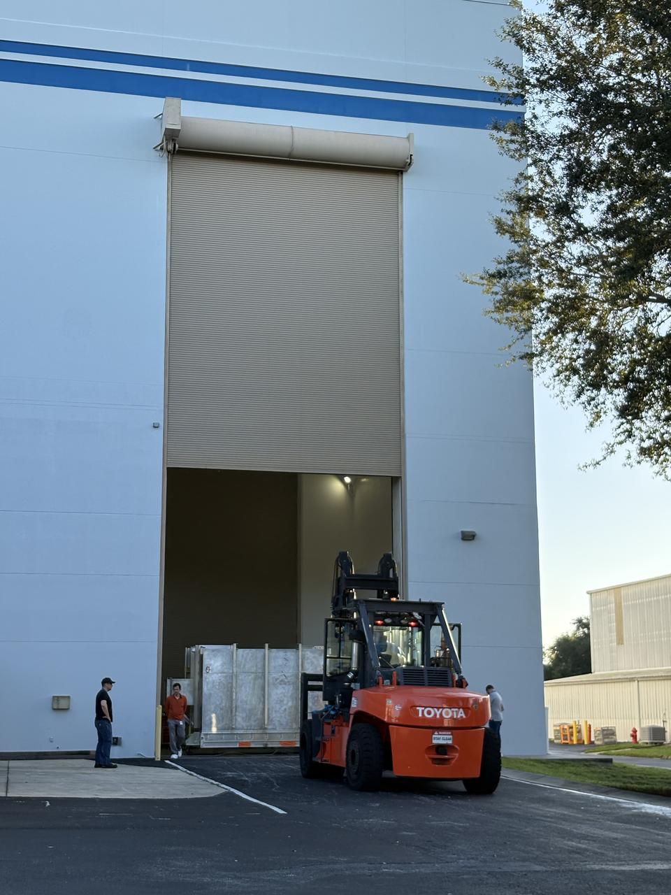 Technicians prepare to transport NASA’s IMAP (Interstellar Mapping and Acceleration Probe) observatory to Building 2 where they will load 317 pounds (or 144 kilograms) of hydrazine into three tanks into the spacecraft at the Astrotech Space Operations Facility near NASA’s Kennedy Space Center in Florida on Tuesday, Aug. 12, 2025. IMAP will explore and map the boundaries of the heliosphere — a huge bubble created by the Sun’s wind that encapsulates our entire solar system — and study how the heliosphere interacts with the local galactic neighborhood beyond. 