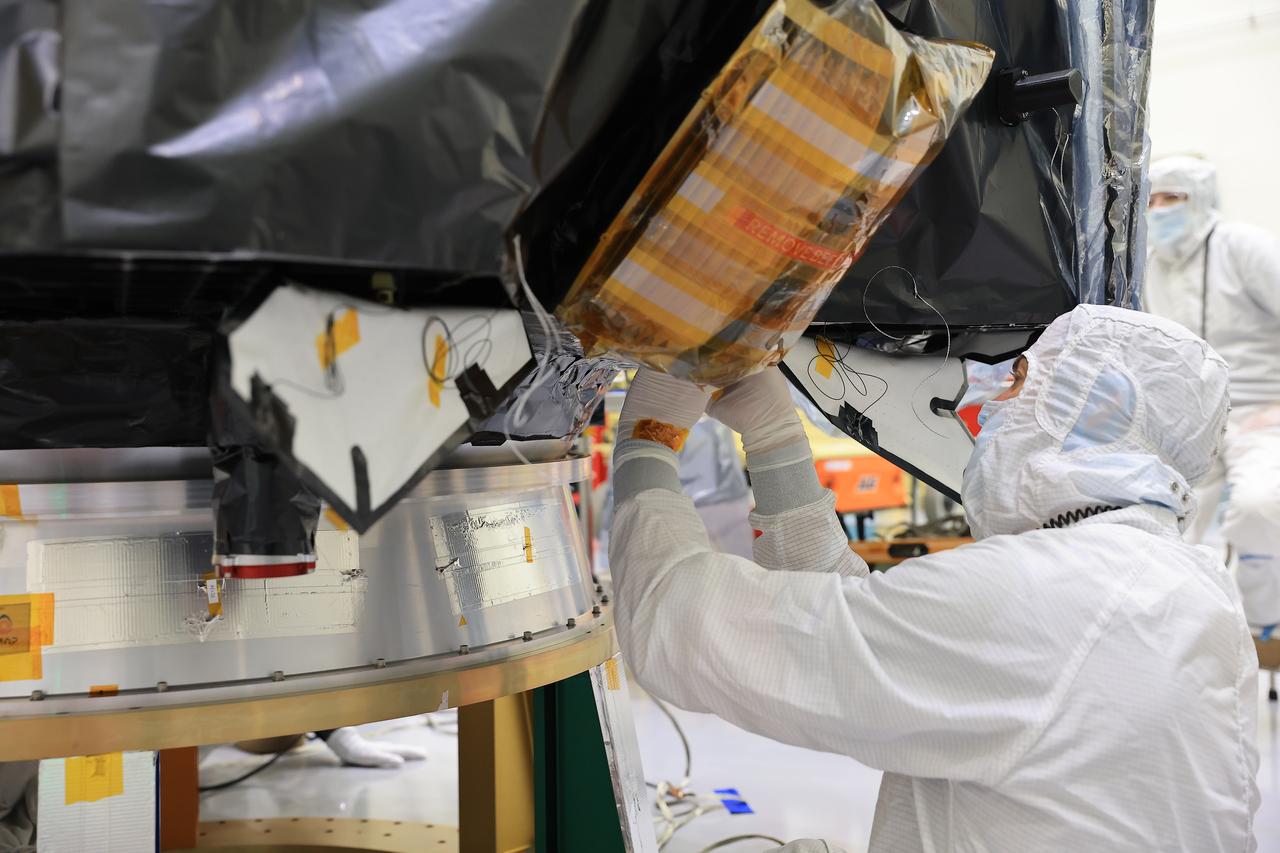 Technicians conduct blanket closeout work on NASA’s IMAP (Interstellar Mapping and Acceleration Probe) observatory at the Astrotech Space Operations Facility near NASA’s Kennedy Space Center in Florida on Friday, Aug. 15, 2025. IMAP will explore and map the boundaries of the heliosphere — a huge bubble created by the Sun’s wind that encapsulates our entire solar system — and study how the heliosphere interacts with the local galactic neighborhood beyond.