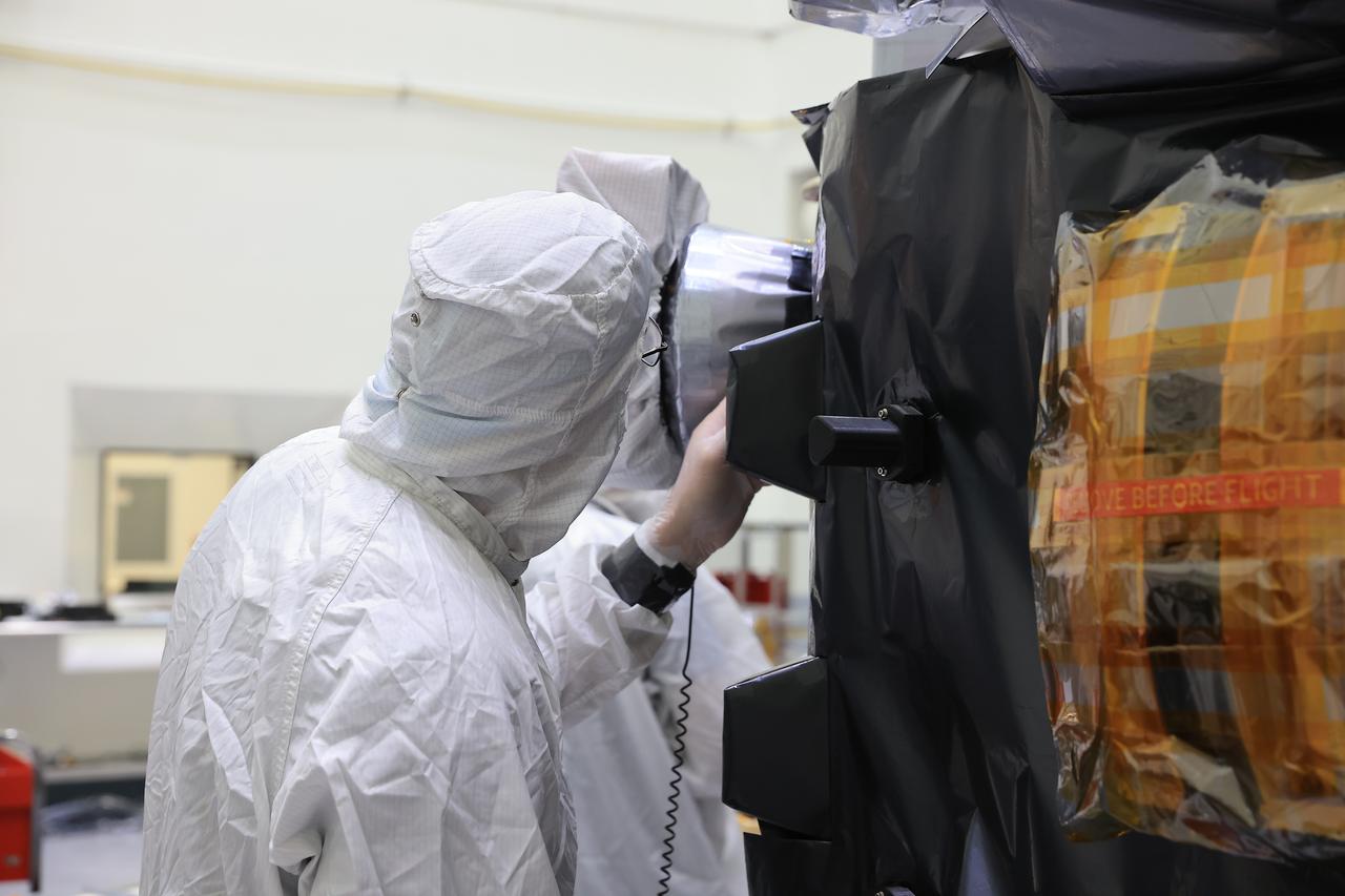 Technicians conduct blanket closeout work on NASA’s IMAP (Interstellar Mapping and Acceleration Probe) observatory at the Astrotech Space Operations Facility near NASA’s Kennedy Space Center in Florida on Friday, Aug. 15, 2025. IMAP will explore and map the boundaries of the heliosphere — a huge bubble created by the Sun’s wind that encapsulates our entire solar system — and study how the heliosphere interacts with the local galactic neighborhood beyond.